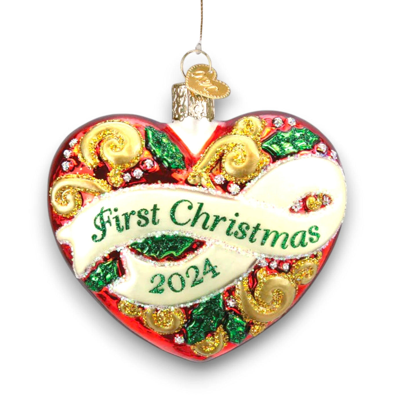 2024 First Christmas Heart Ornament featuring a vibrant red heart with gold accents, glitter details, and “First Christmas 2024” lettering across a white banner.