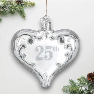 25th Anniversary Heart Christmas Ornament featuring a silver heart with intricate scrollwork and glitter accents, perfect for celebrating a silver anniversary.