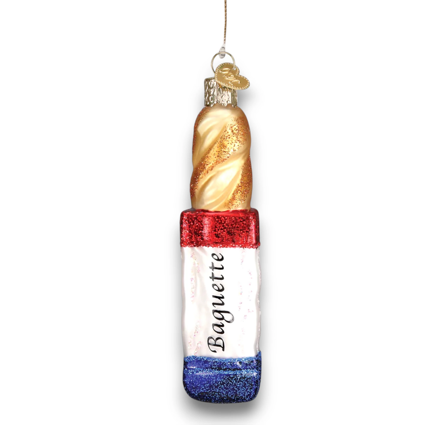 A glittery baguette Christmas ornament featuring a golden loaf and a red, white, and blue tricolor design inspired by the French flag.