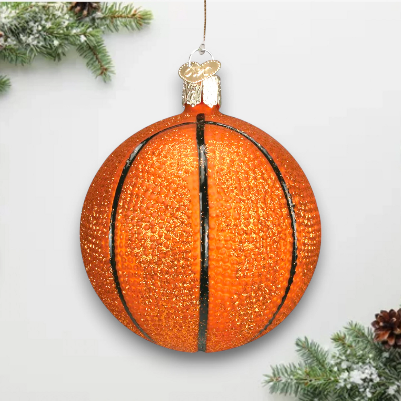 Personalized Basketball Christmas Ornament featuring a glittery orange basketball design, customizable with name and year.