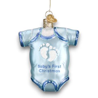 Blue baby onesie Christmas ornament featuring glittery footprints and the phrase “Baby’s First Christmas,” perfect for commemorating a baby’s first holiday.