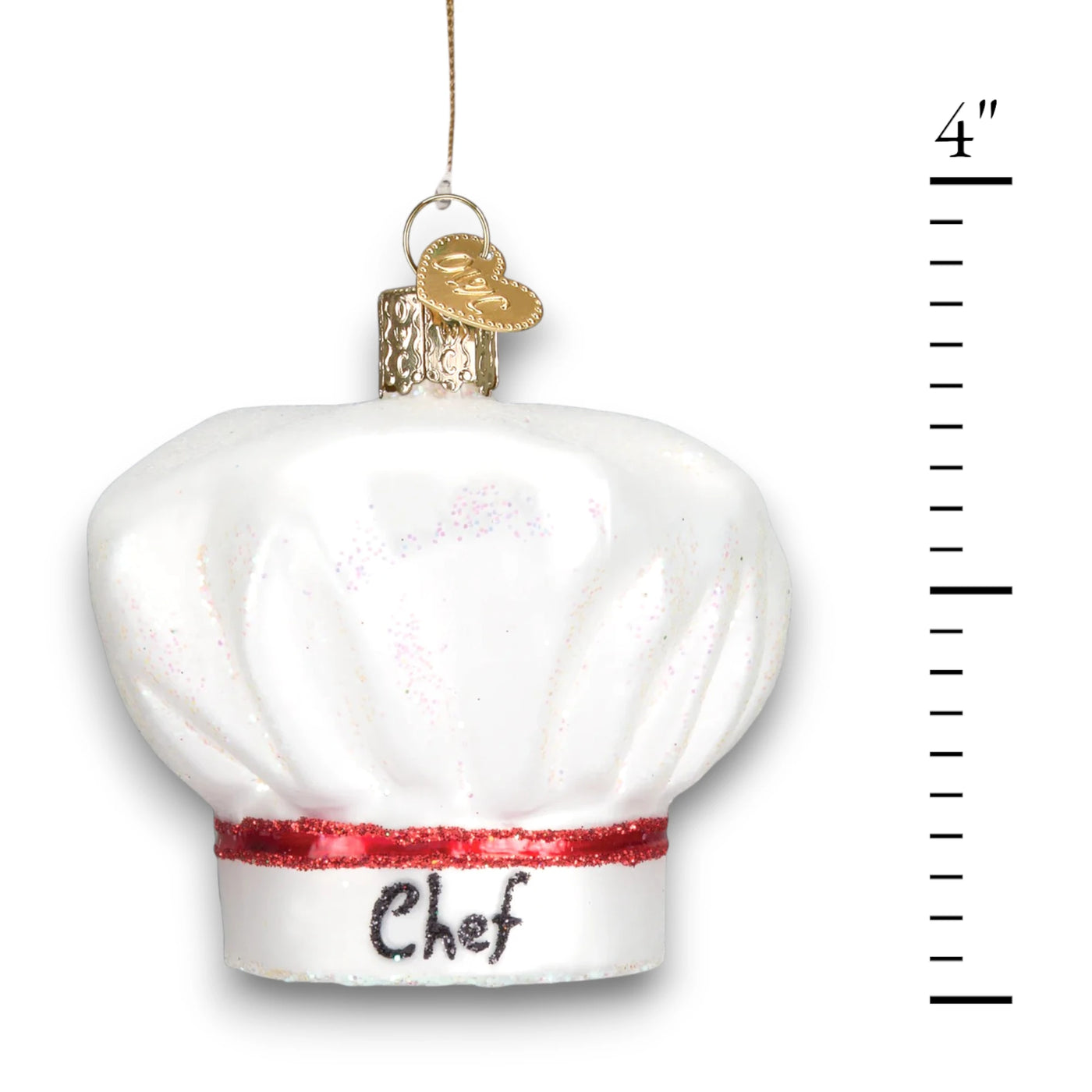 White chef’s hat Christmas ornament with a red glitter band and “Chef” written on the front, featuring elegant shimmering details.