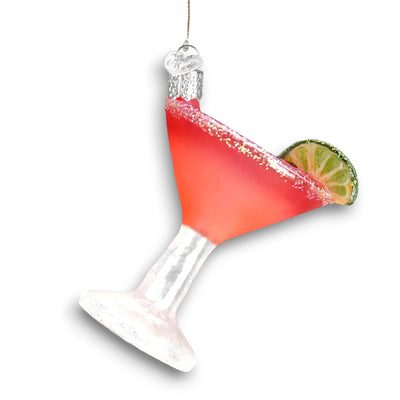 Cosmopolitan cocktail Christmas ornament featuring a vibrant pink drink, glittered sugared rim, and lime wedge garnish in a clear glass.