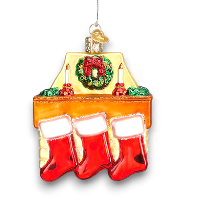 Family of 3 stockings Christmas ornament featuring a cozy fireplace with red stockings, candles, and a wreath, customizable with names and year.