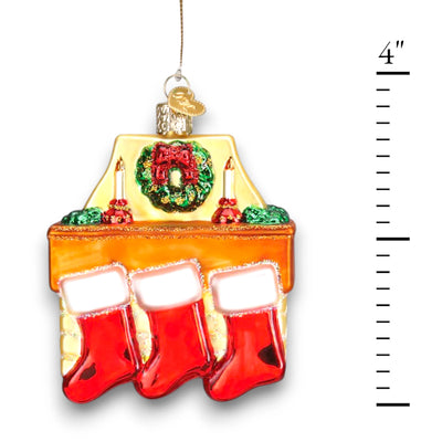 Family of 3 stockings Christmas ornament featuring a cozy fireplace with red stockings, candles, and a wreath, customizable with names and year.