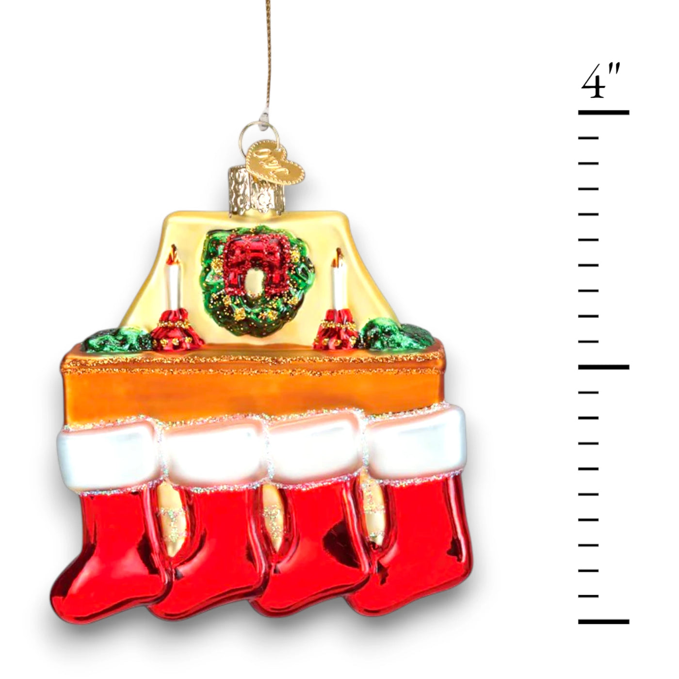 Family of 4 stockings Christmas ornament featuring a cozy fireplace with red stockings, candles, and a wreath, customizable with names and year.