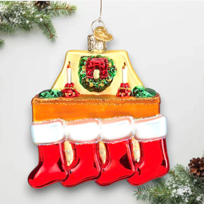 Family of 4 stockings Christmas ornament featuring a cozy fireplace with red stockings, candles, and a wreath, customizable with names and year.