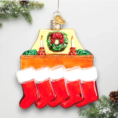 Family of 5 stockings Christmas ornament featuring a cozy fireplace with red stockings, candles, and a wreath, customizable with names and year.