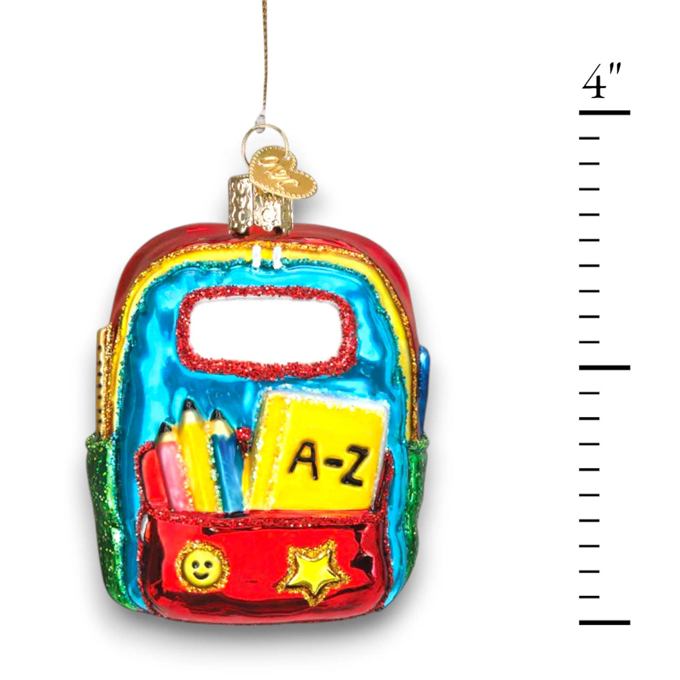 Personalized First Day Of School Christmas Ornament featuring a colorful backpack with school supplies, customizable with a name and year.