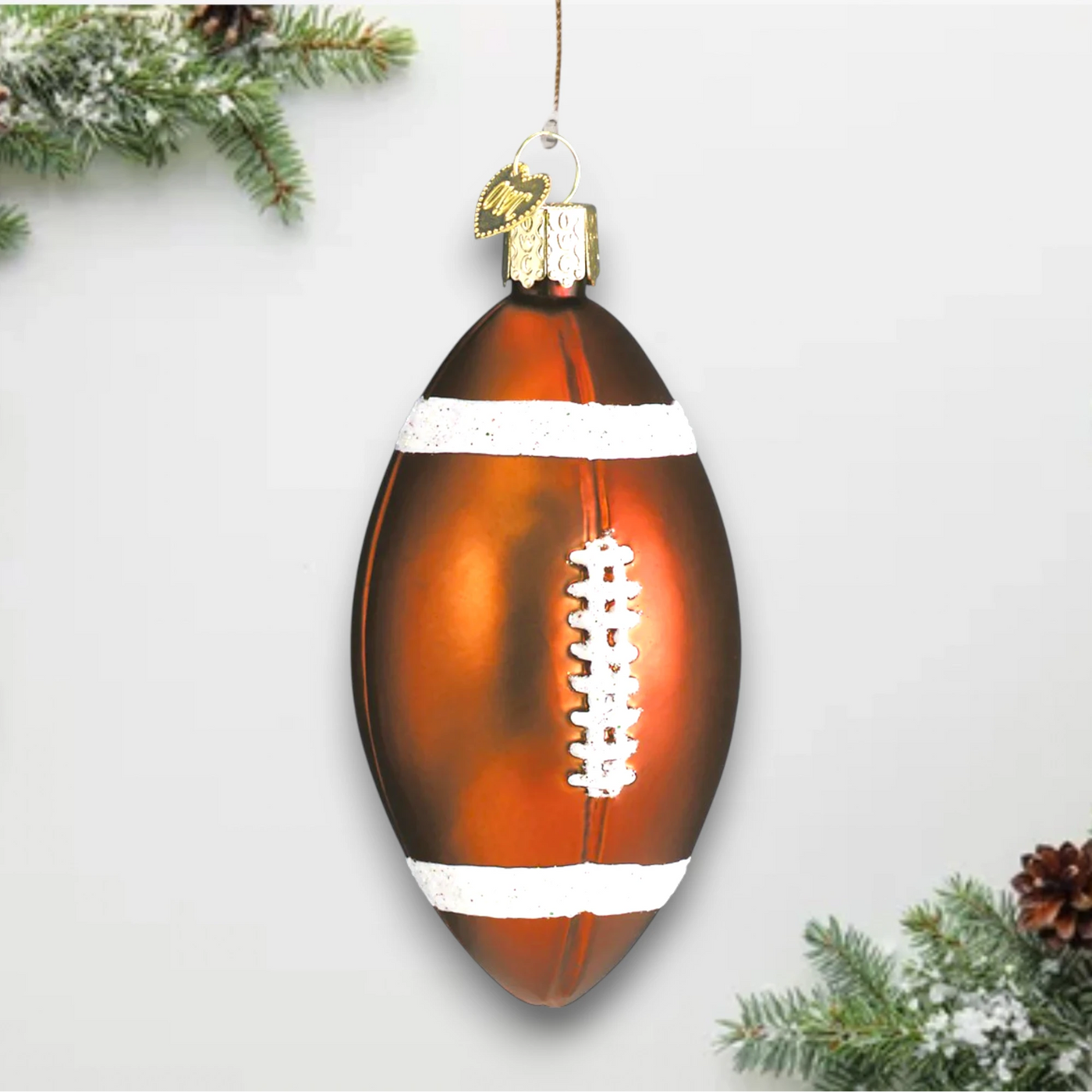 Personalized Football Christmas Ornament featuring a classic brown football design with white glitter laces and stripes, customizable with name and year.