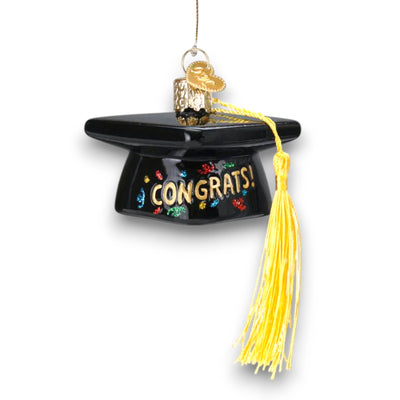 Personalized Graduation Cap Christmas Ornament featuring a black cap with gold “Congrats!” lettering, colorful glitter details, and a yellow tassel, customizable with name and year.