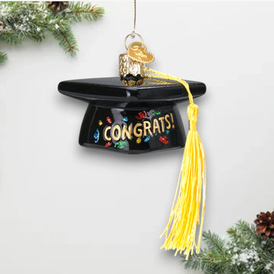 Personalized Graduation Cap Christmas Ornament featuring a black cap with gold “Congrats!” lettering, colorful glitter details, and a yellow tassel, customizable with name and year.