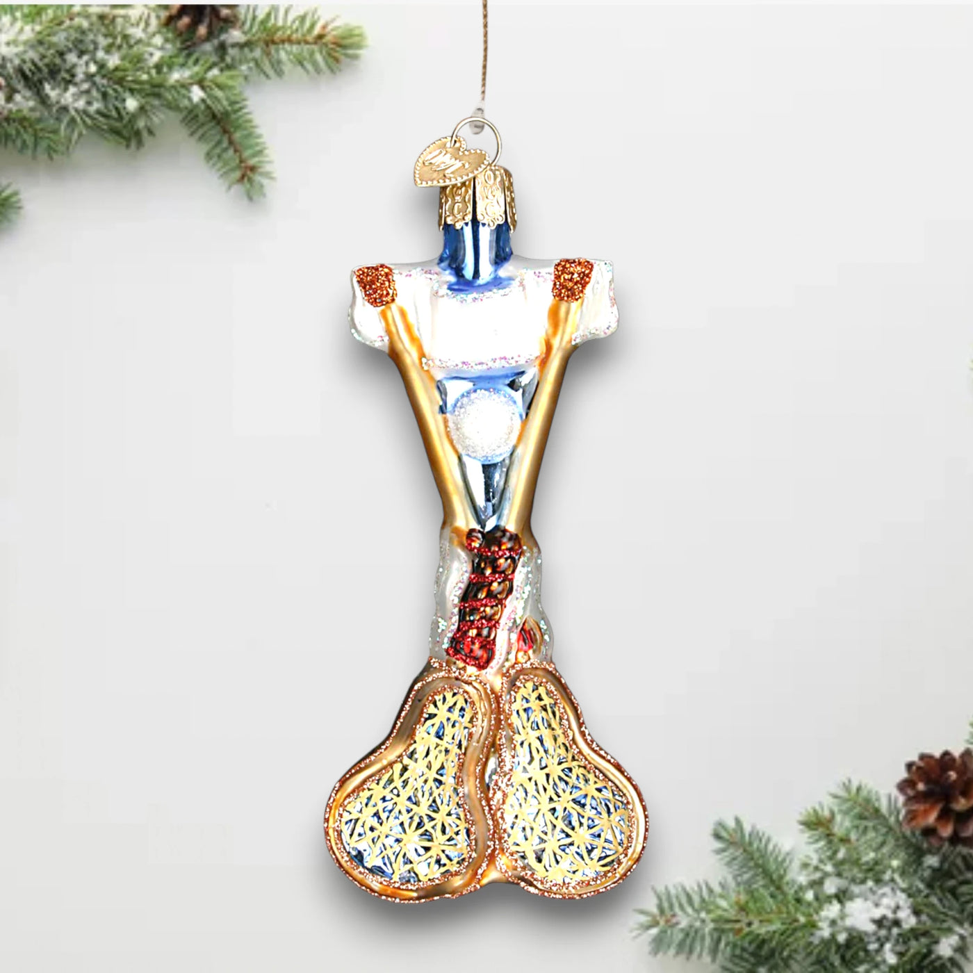 Lacrosse-themed Christmas ornament featuring crossed lacrosse sticks with detailed netting, a ball, and glitter accents, customizable with name and year.