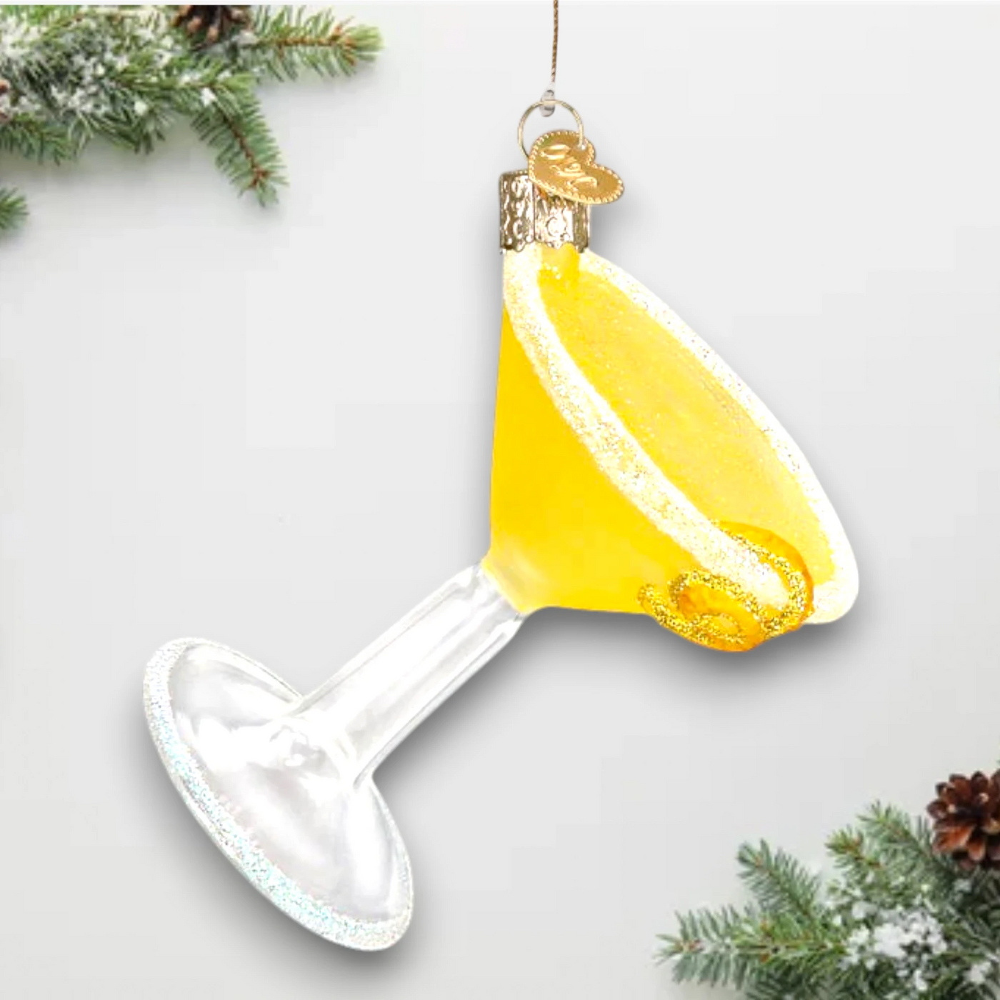 Personalized Lemon Drop Martini Christmas Ornament featuring a yellow martini glass with a glittered sugared rim and lemon peel accent, customizable with name and year.