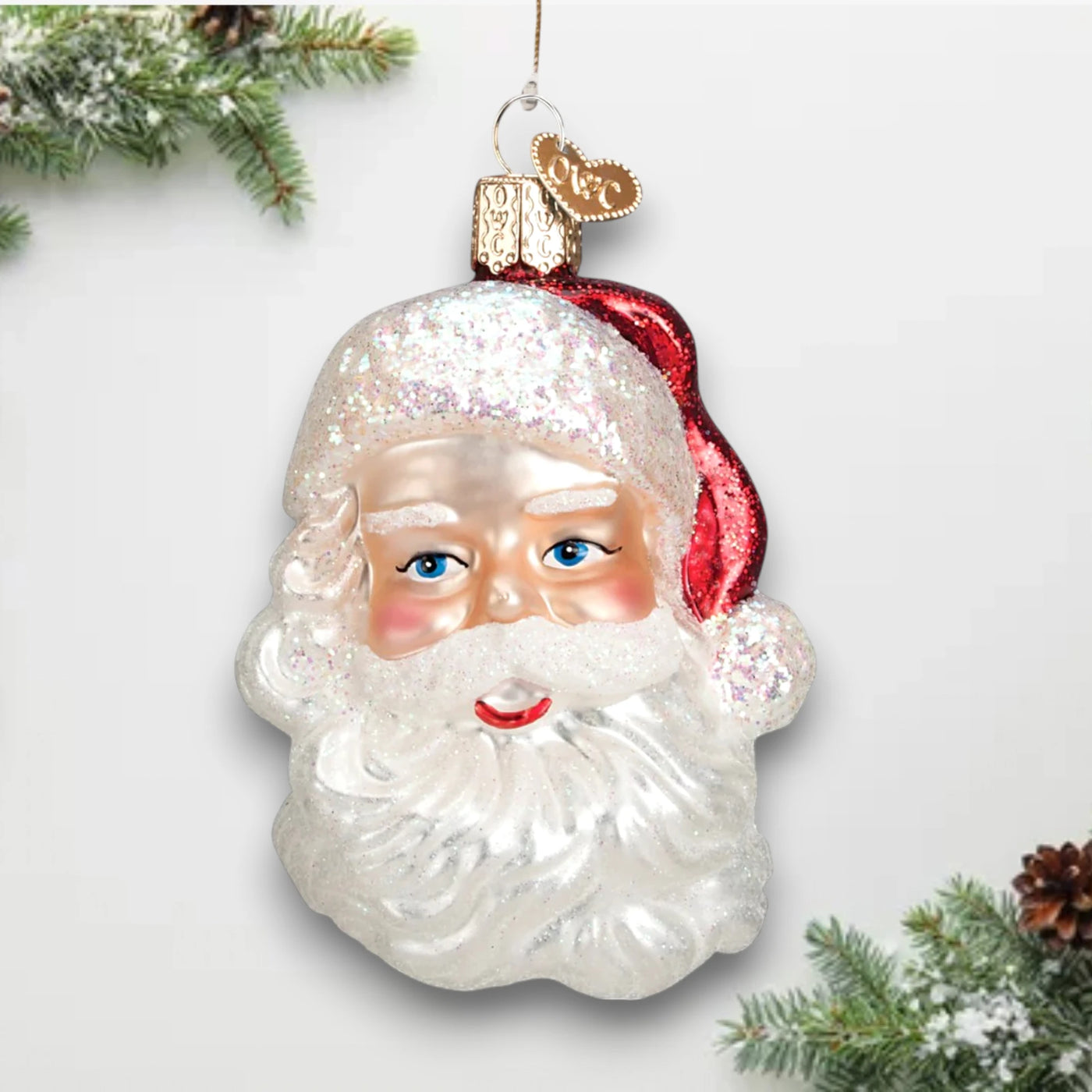 Personalized Mid-century Santa Head Christmas Ornament featuring a classic Santa face with glittered beard and red hat, customizable with name and year.