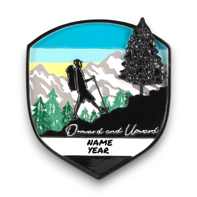 Personalized Adventure Badge Christmas Ornament with customizable name and year, featuring a hiker against a scenic mountain background.