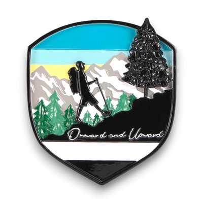 Personalized Adventure Badge Christmas Ornament with customizable name and year, featuring a hiker against a scenic mountain background.