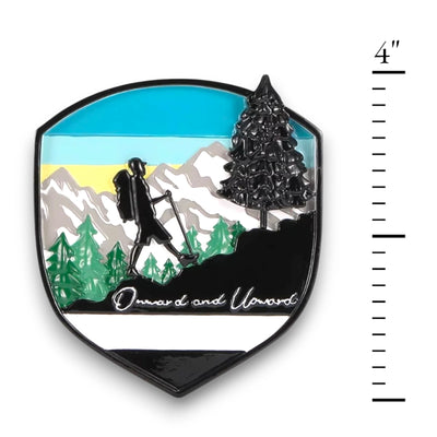 Personalized Adventure Badge Christmas Ornament with customizable name and year, featuring a hiker against a scenic mountain background.