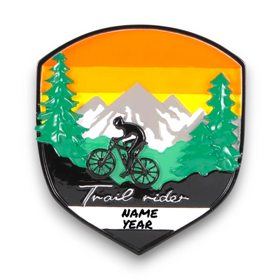 Personalized Adventure Badge Mountain Biking Christmas Ornament with customizable name and year, featuring a cyclist on a trail with mountain and forest backdrop.