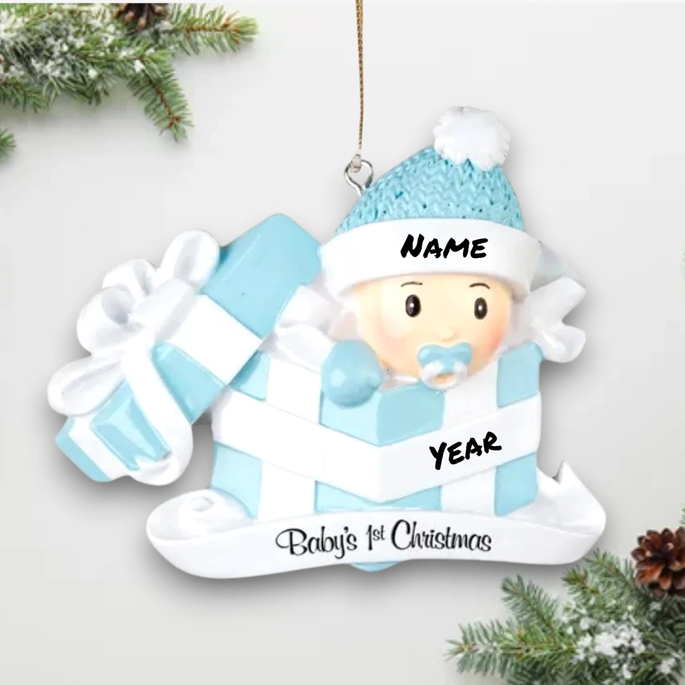 Personalized Baby Boy Christmas Ornament with baby in a blue present box, customizable with name and year.