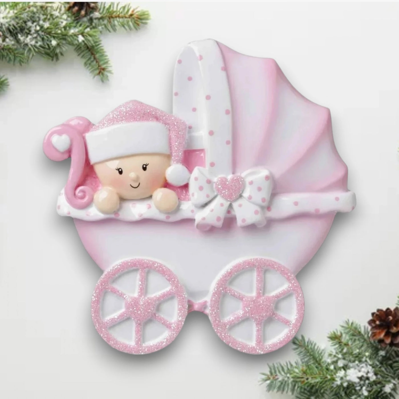 Personalized Baby Carriage Pink Christmas Ornament with customizable name and year, featuring a baby in a pink carriage with glitter accents.