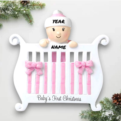 Personalized Baby Girl in Crib Christmas Ornament with customizable name and year, featuring a baby girl peeking over a crib with pink bows and glitter accents.