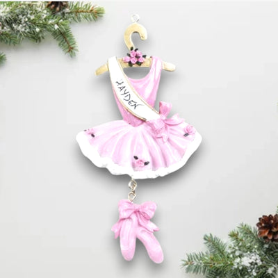 Personalized Ballet Christmas Ornament featuring a pink tutu, dangling ballet slippers, and customizable sash with name and year.