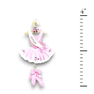 Personalized Ballet Christmas Ornament featuring a pink tutu, dangling ballet slippers, and customizable sash with name and year.