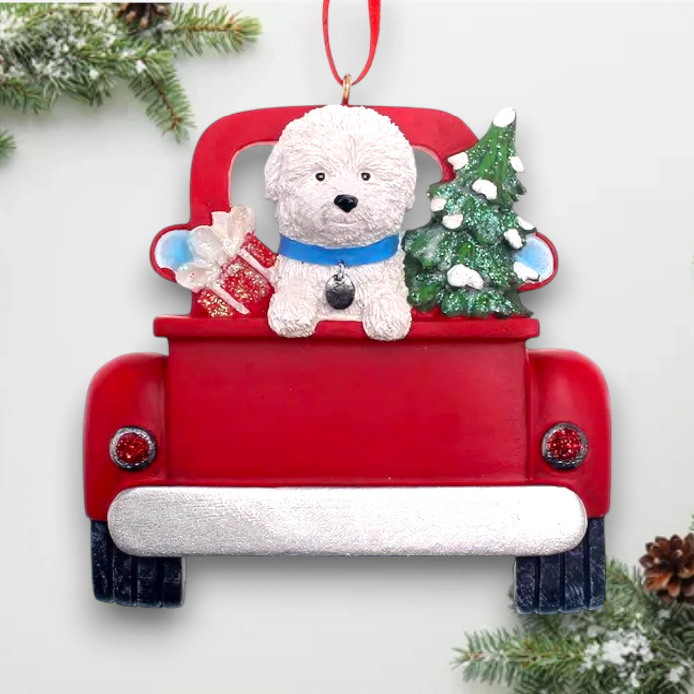 Personalized Bichon Frise In Back Of Truck Christmas Ornament featuring a Bichon Frise, Christmas tree, and gifts in a red truck with customizable name and year.