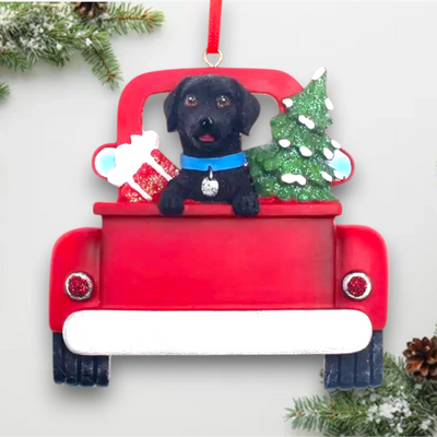 Personalized Black Labrador In Back Of Truck Christmas Ornament featuring a Black Labrador, festive Christmas tree, and holiday gifts in a red truck with customizable name and year.
