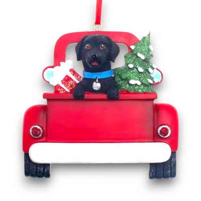 Personalized Black Labrador In Back Of Truck Christmas Ornament featuring a Black Labrador, festive Christmas tree, and holiday gifts in a red truck with customizable name and year.