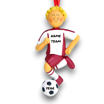 Personalized Blonde Male Soccer Ornament, wearing a red uniform and dribbling a soccer ball, customizable with name, team, and year.