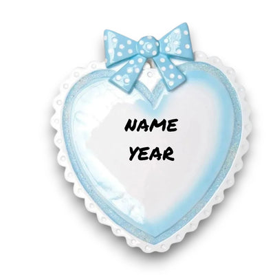 Personalized Blue Baby Heart Christmas Ornament with customizable name and year, adorned with a blue polka-dot bow.