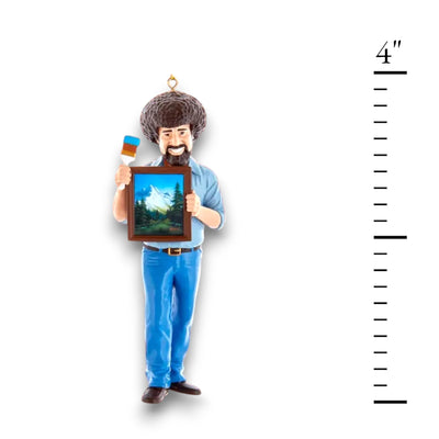 Personalized Bob Ross Christmas Ornament featuring Bob Ross holding a framed painting and palette, customizable with a name and year.
