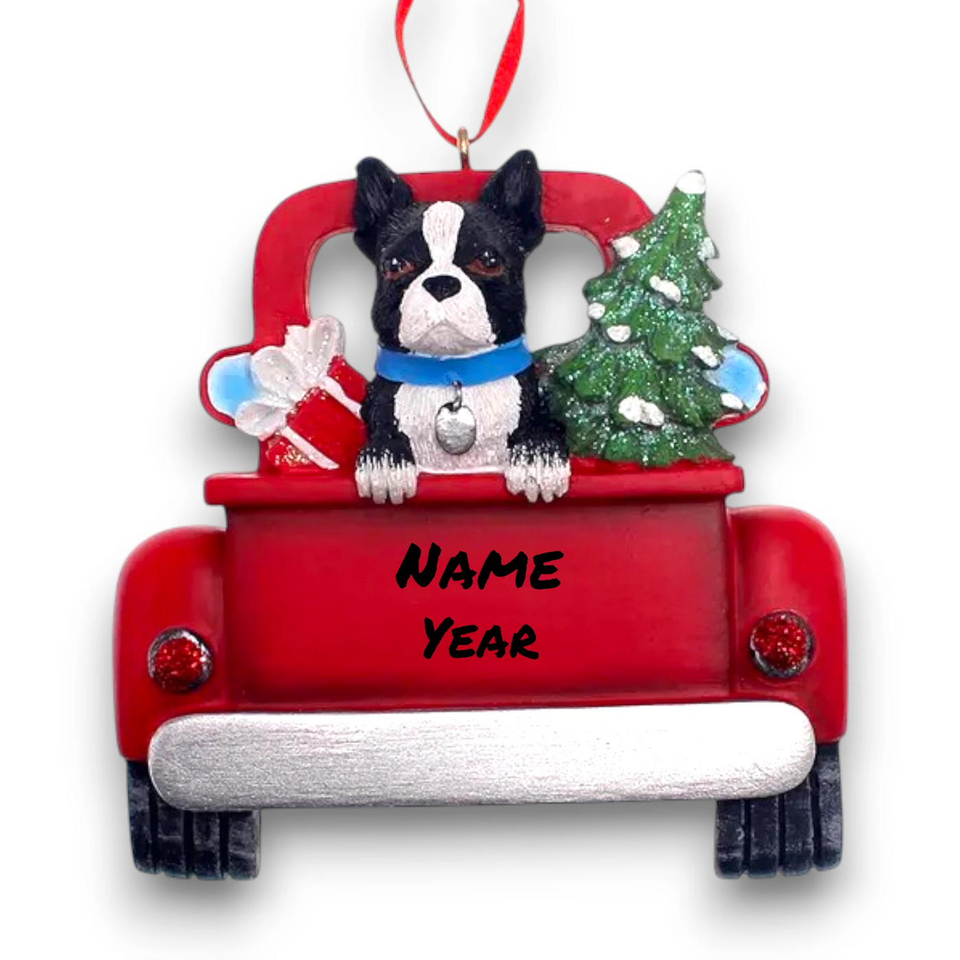 Personalized Boston Terrier In Back Of Truck Christmas Ornament featuring a Boston Terrier, festive Christmas tree, and holiday gifts in a red truck with customizable name and year.