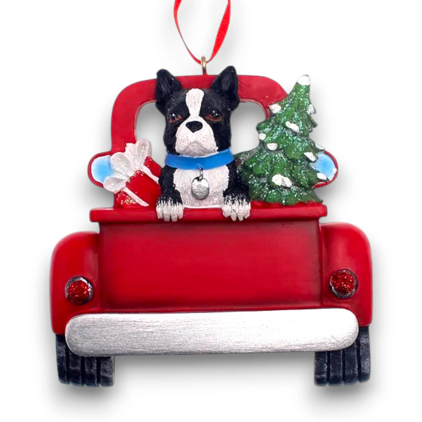 Personalized Boston Terrier In Back Of Truck Christmas Ornament featuring a Boston Terrier, festive Christmas tree, and holiday gifts in a red truck with customizable name and year.