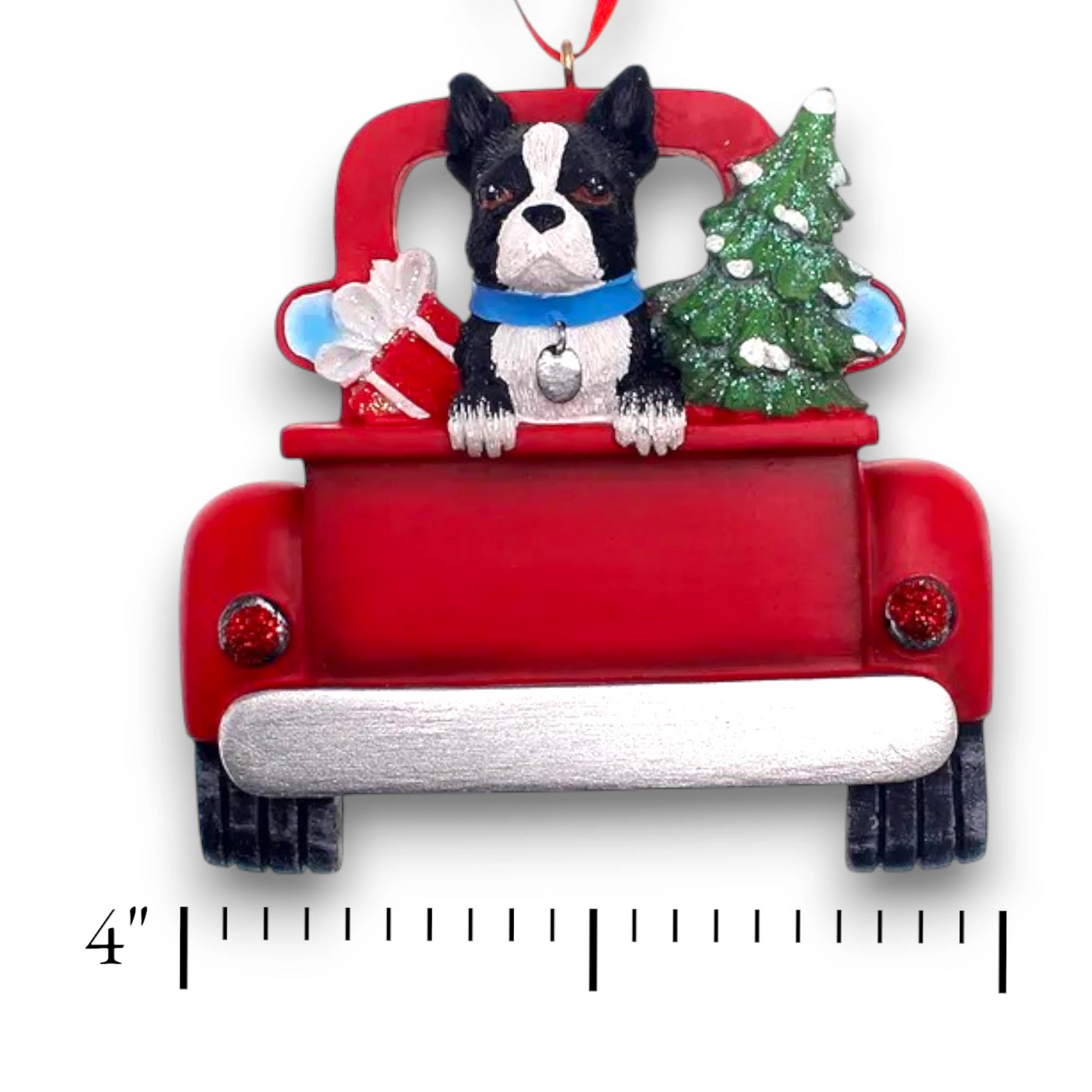 Personalized Boston Terrier In Back Of Truck Christmas Ornament featuring a Boston Terrier, festive Christmas tree, and holiday gifts in a red truck with customizable name and year.