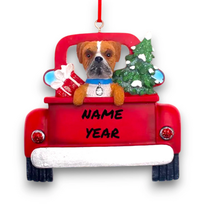 Personalized Boxer In Back Of Truck Christmas Ornament featuring a Boxer, festive Christmas tree, and holiday gifts in a red truck with customizable name and year.
