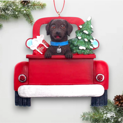 Personalized Brown Labrador In Back Of Truck Christmas Ornament featuring a Brown Labrador, festive Christmas tree, and holiday gifts in a red truck with customizable name and year.