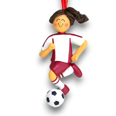 Personalized Brunette Female Dribbling Soccer Ornament in Red Uniform, customizable with name, team, and year.