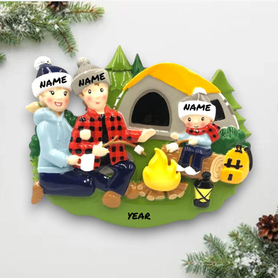  Personalized family of 3 camping ornament with family members around a campfire and tent, customizable with names and year.
