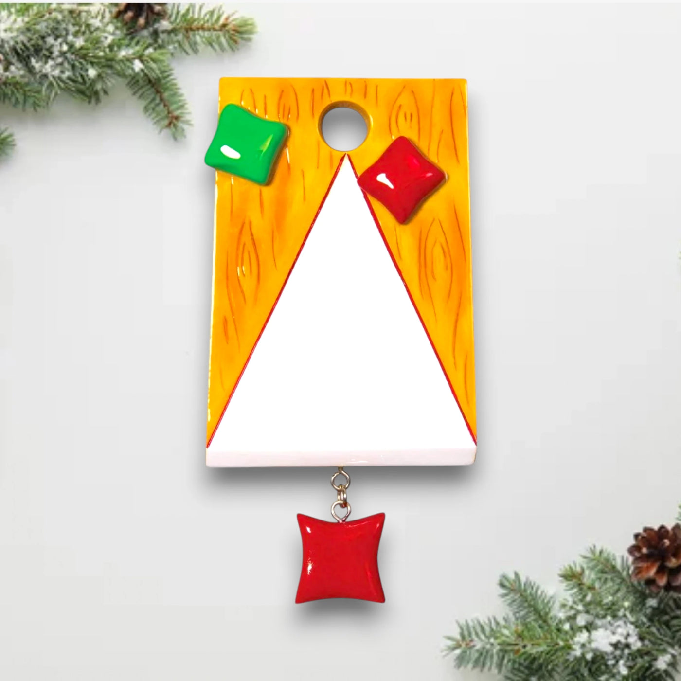  Personalized Corn Hole Bag Toss Christmas Ornament with customizable name, featuring a mini corn hole board and colorful bean bags.
