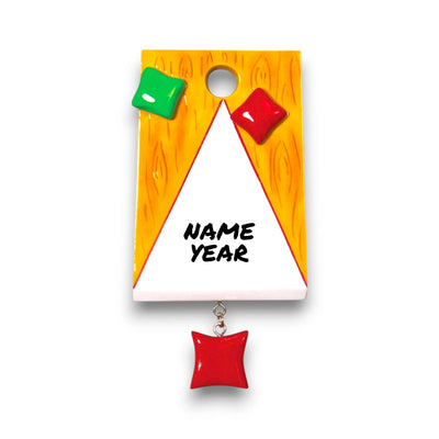  Personalized Corn Hole Bag Toss Christmas Ornament with customizable name, featuring a mini corn hole board and colorful bean bags.
