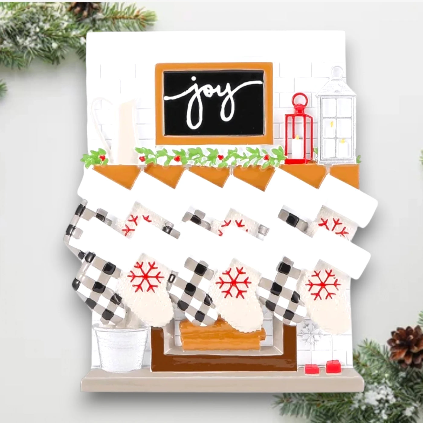 Personalized Fireplace Mantle Family of 12 Christmas Ornament with customizable names and year, featuring twelve stockings on a festive mantle.
