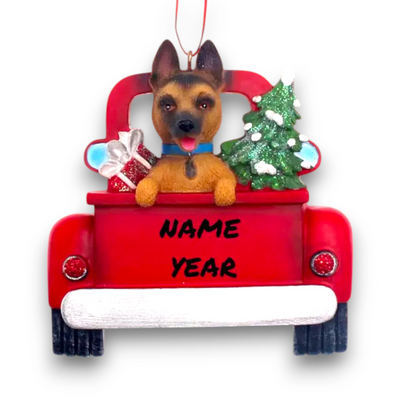 Personalized German Shepherd In Back Of Truck Christmas Ornament featuring a German Shepherd, Christmas tree, and holiday presents in a festive red truck with customizable name and year.
