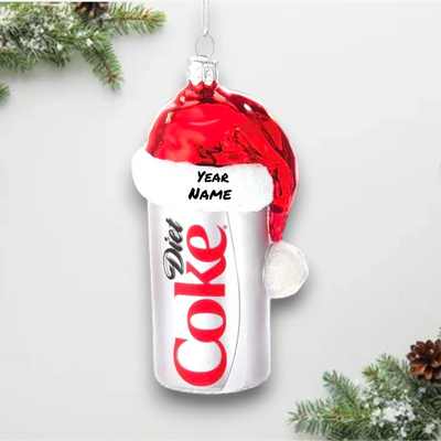 Personalized Diet Coke Can With Santa Hat Christmas Ornament featuring a Diet Coke can topped with a festive red Santa hat.
