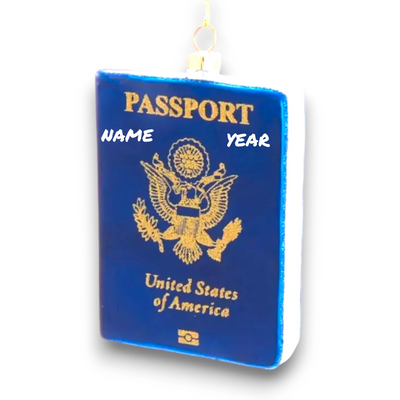 Personalized Glass Passport Christmas Ornament featuring a blue U.S. passport design with gold detailing.
