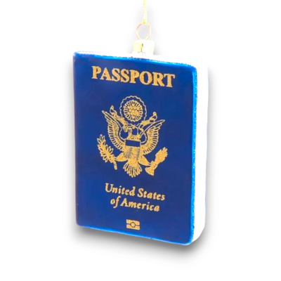 Personalized Glass Passport Christmas Ornament featuring a blue U.S. passport design with gold detailing.
