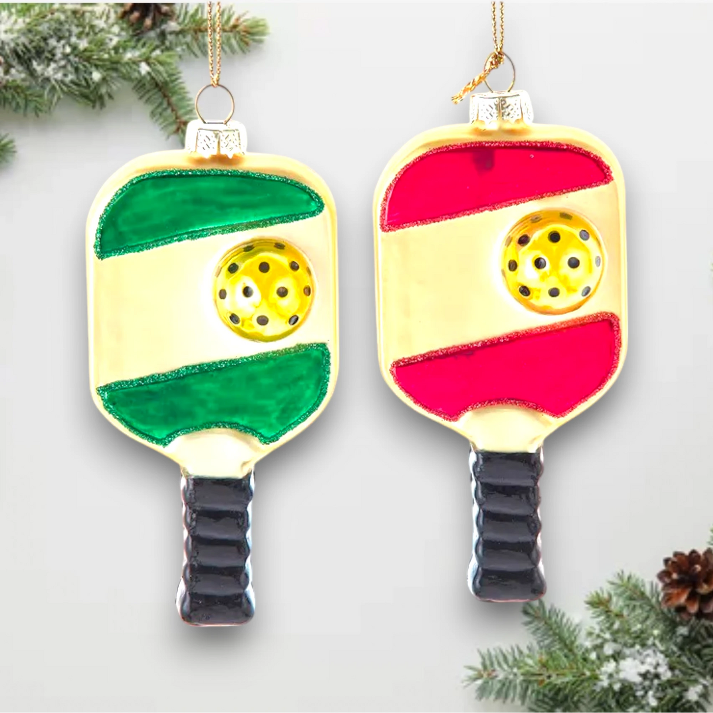 Personalized Glass Pickleball Christmas Ornament featuring colorful pickleball paddles with green or red accents, detailed pickleball, and a hanging loop for customization with a name and year.
