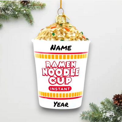 Personalized Glass Ramen Noodle Cup Christmas Ornament featuring a realistic cup of instant noodles with golden broth, vegetables, and custom personalization.
